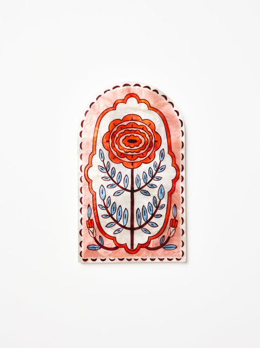 Arch shape wall art with red flower, blue leaves and pink and burgundy details. 