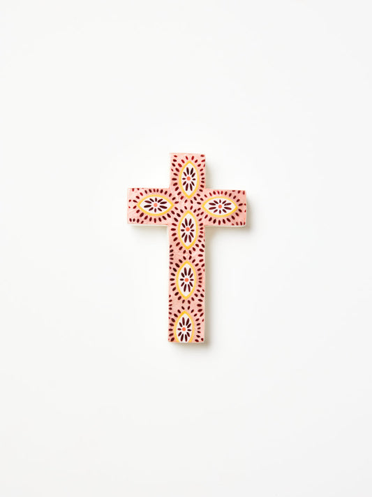 Small wall cross with pink, yellow and burgundy dot details.