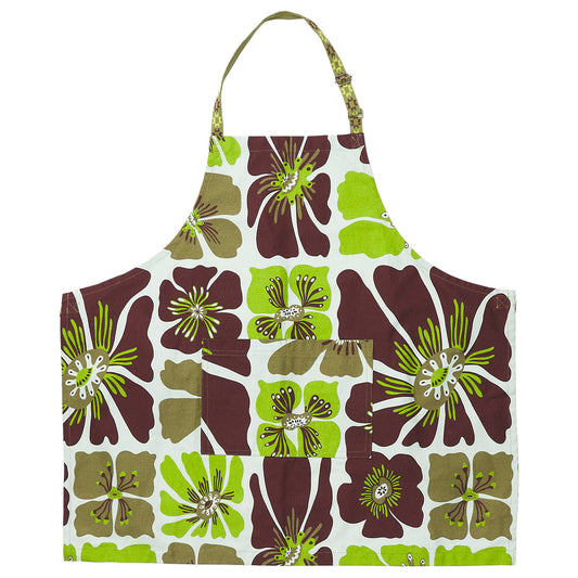 A white kitchen apron featuring a bold retro floral pattern in dark brown, olive green, and lime green, with a matching neck strap.