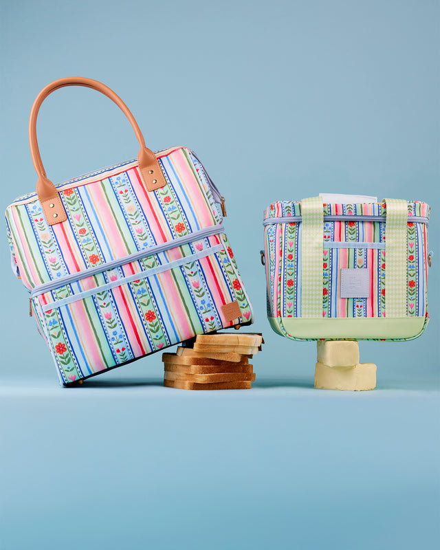 Two striped bags on a blue background