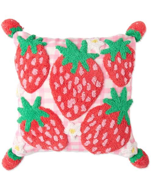 Plush pillow with strawberry pattern on a white background