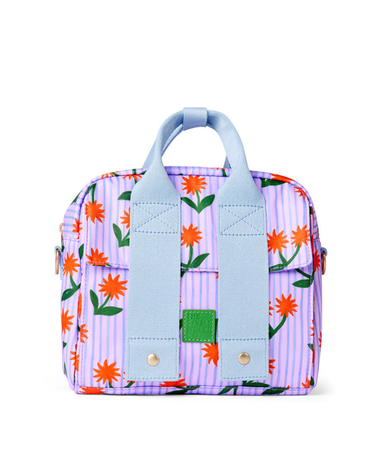 Small backpack with floral pattern and light blue straps on a white background