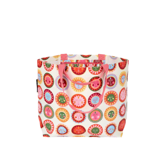 Colorful sun face pattern tote bag with pink handles on a white background