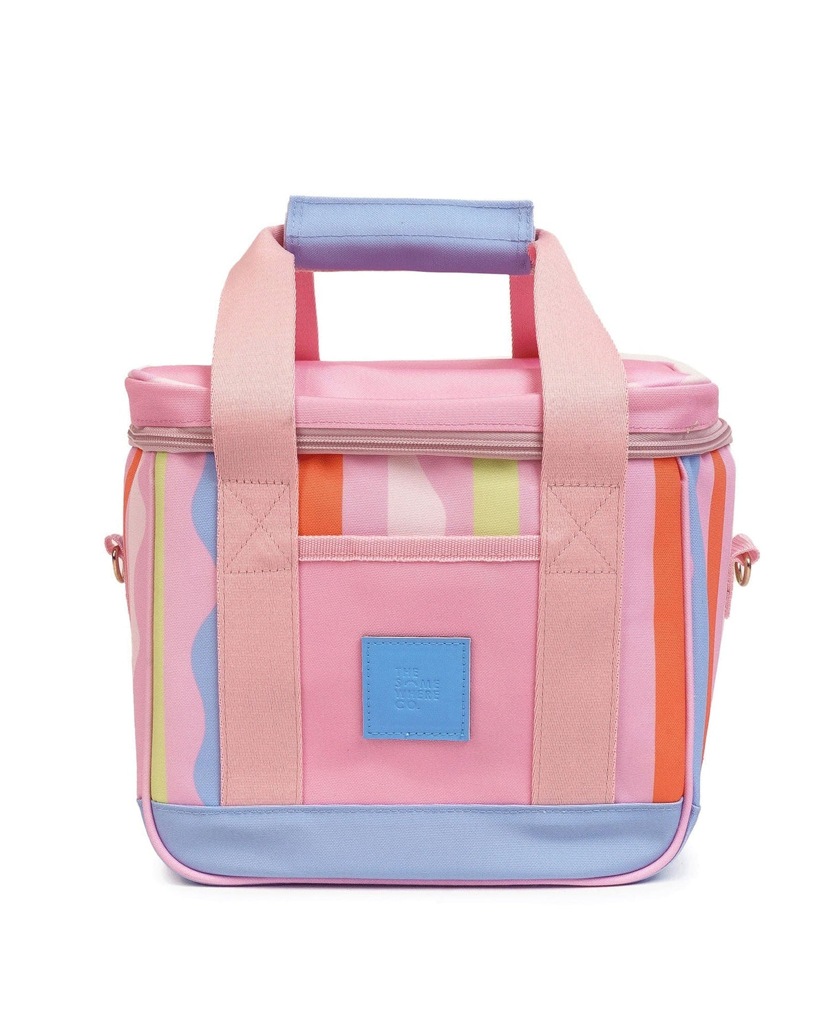 A pastel-colored cooler bag with pink, lavender, orange, and light blue vertical stripes, featuring a top handle, front pocket, and a blue brand patch.