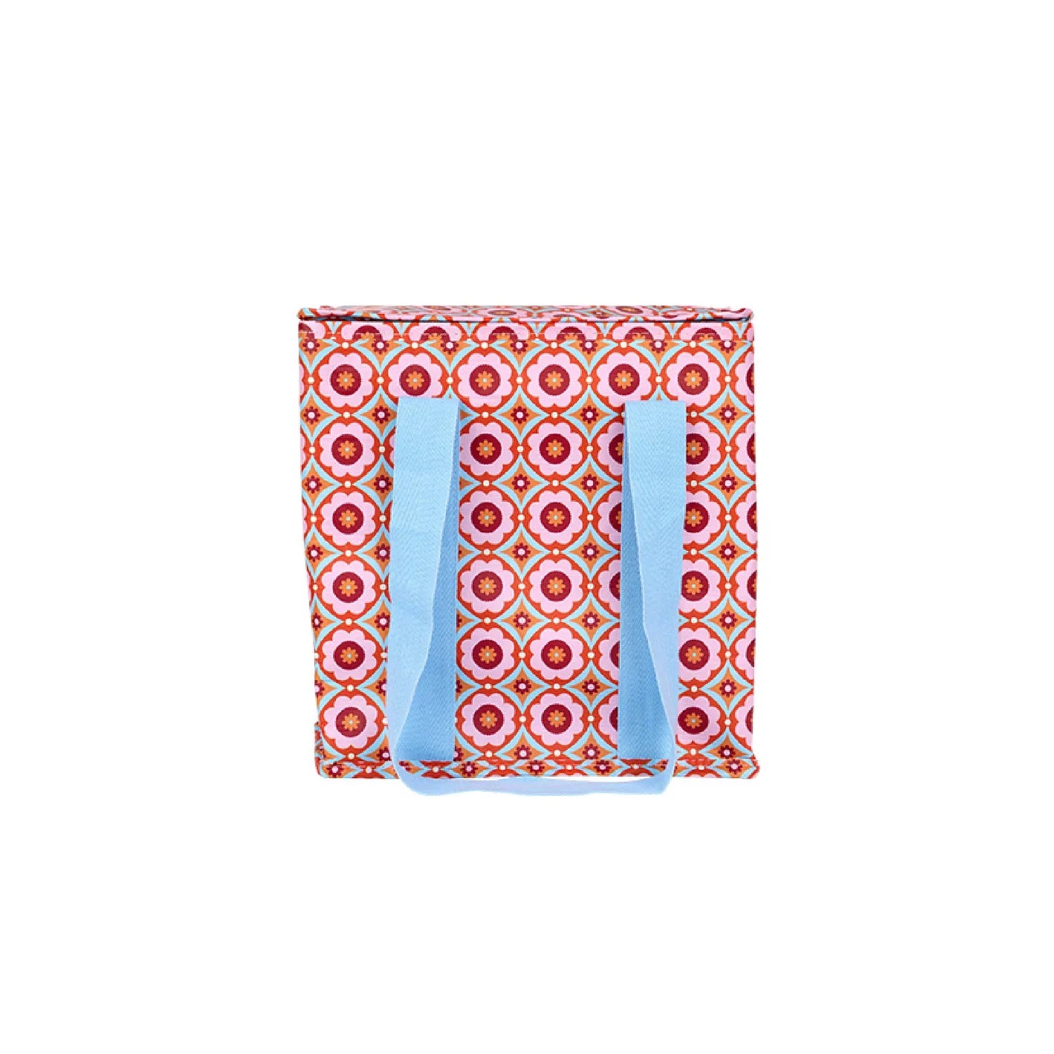 Colorful pink and red tile flower patterned bag with blue handles on a white background