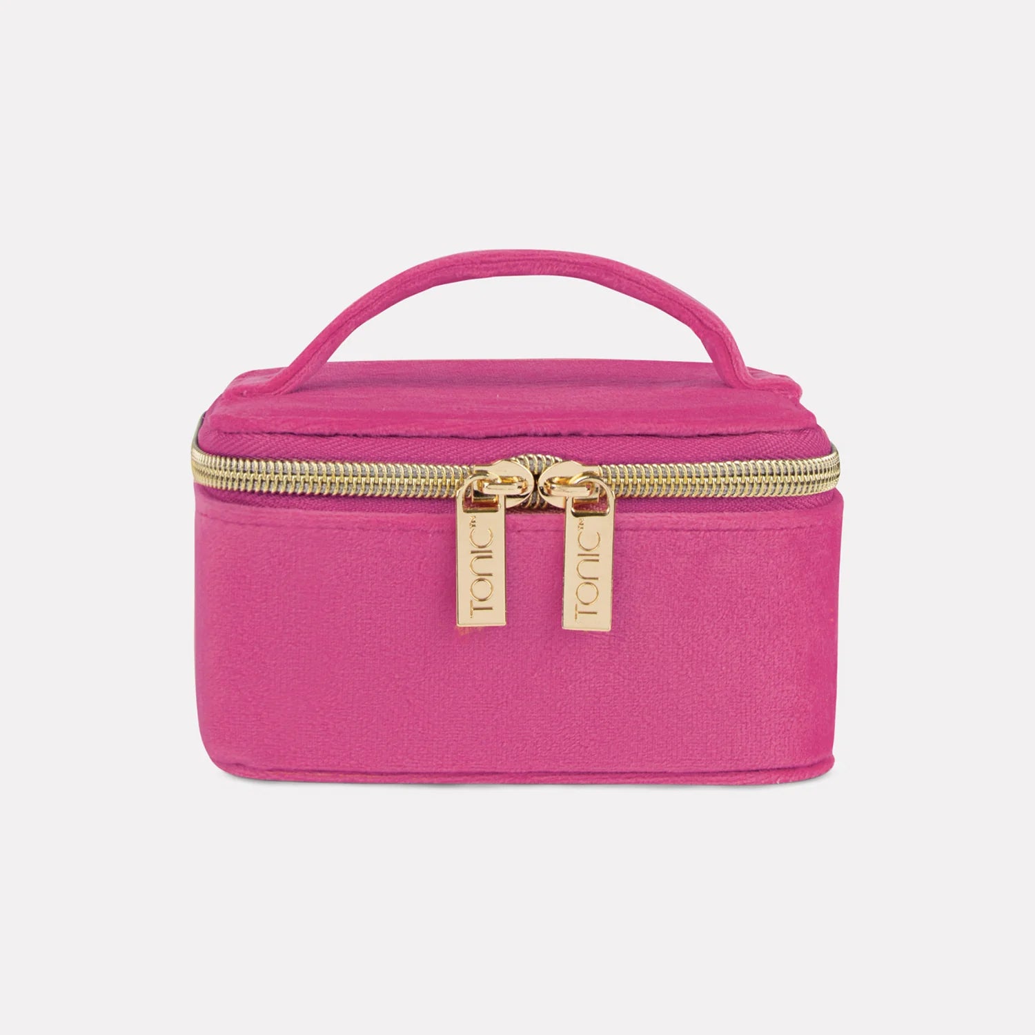 Pink cosmetic bag with gold zipper on a light gray background