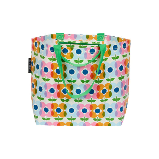 Colorful pink, orange and blue floral-patterned bag with green handles on a white background