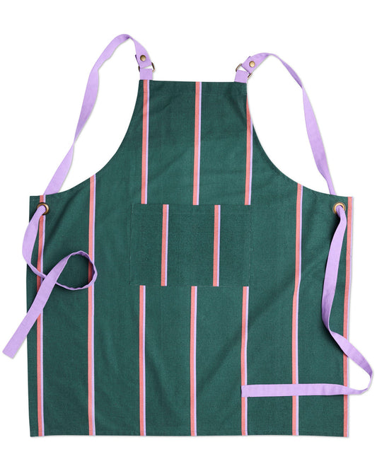 A dark green apron with vertical pink and white stripes, featuring light purple straps and ties, laid flat on a white background.