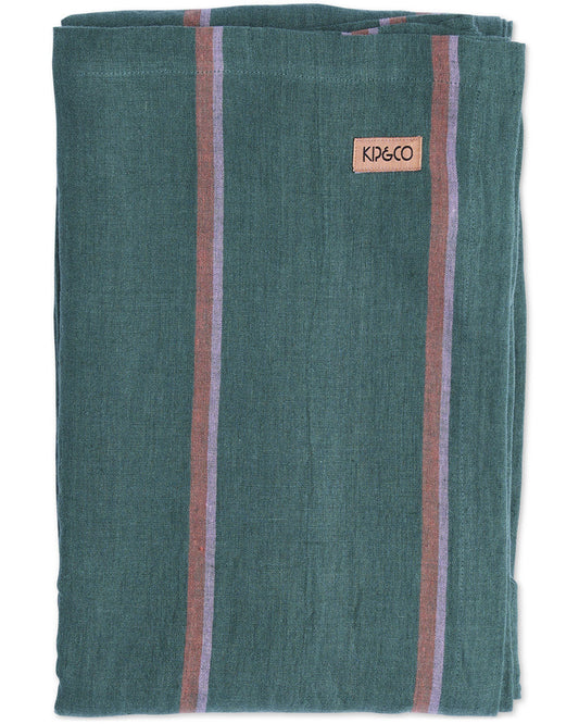 Green tablecloth with striped pattern and KIP&CO branding on a white background